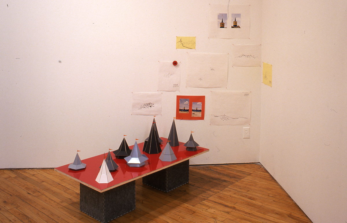 Installation view of the group show trophy, objects displayed on a plinth.