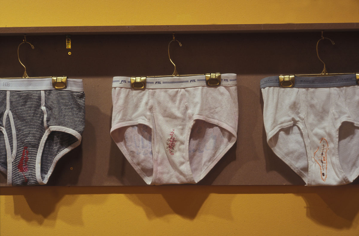 Stephanie Rogerson, men's underwear mounted on the wall.