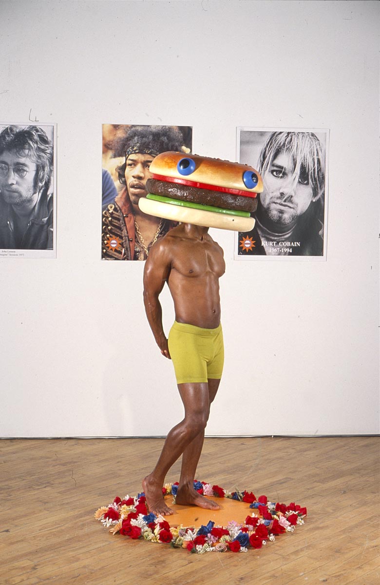 Burgerheaven: Installation View: Man modelling hamburger head. Performance.
