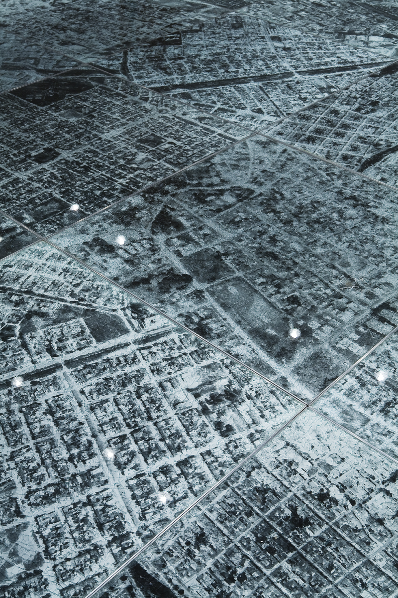 Oscar Munoz: Installation view.He experiments with several techniques in what he refers to image-making in an expanded field, innovating processes on improbable substrates, including silk-screen on water, airbrush drawing on dripping-wet Mylar, and screen-printing with grease on mirrors.