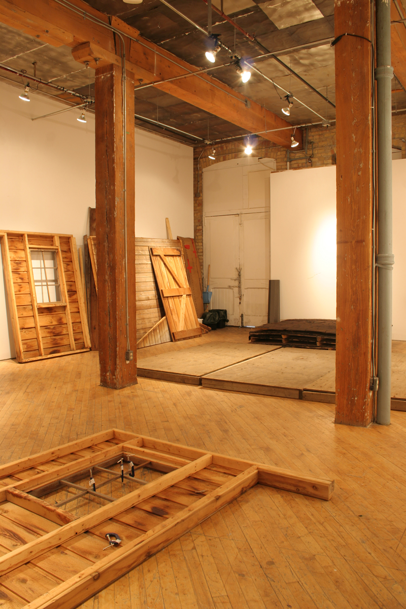 Swintak: Residency, image of wooden planks, laid out.