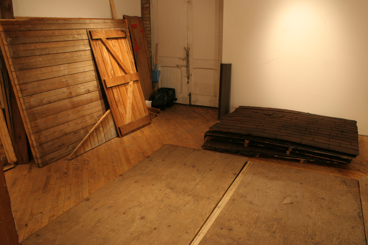 Swintak: Residency, image of wooden planks, laid out.
