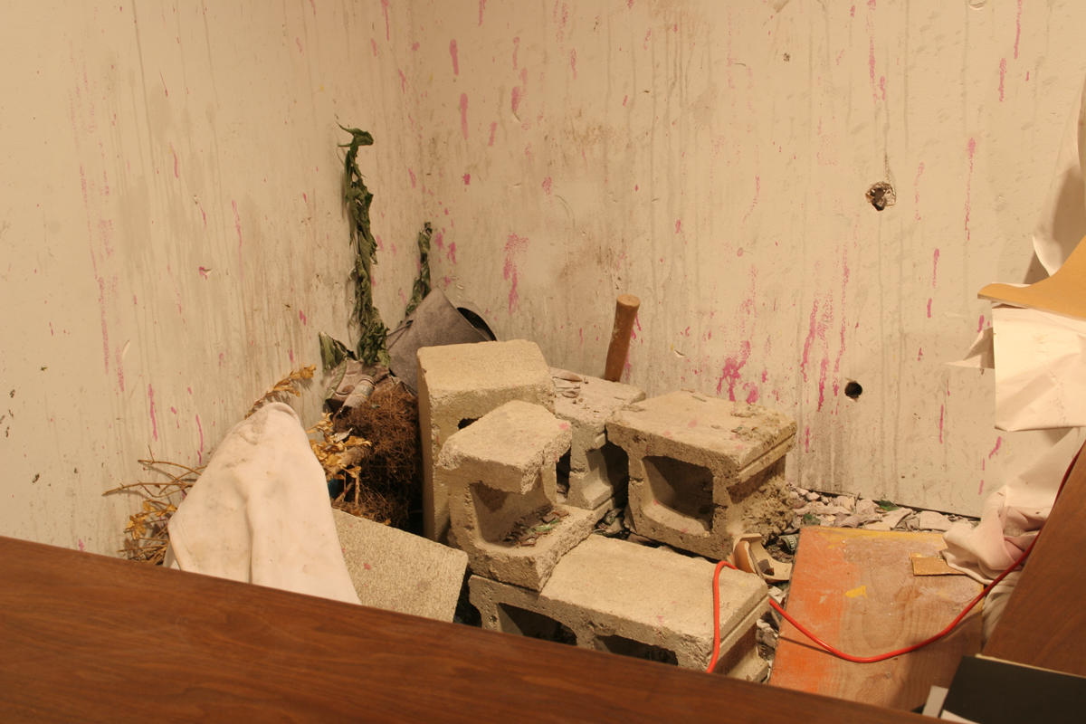 Swintak: Residency, image of tools on wooden desk, laid out.