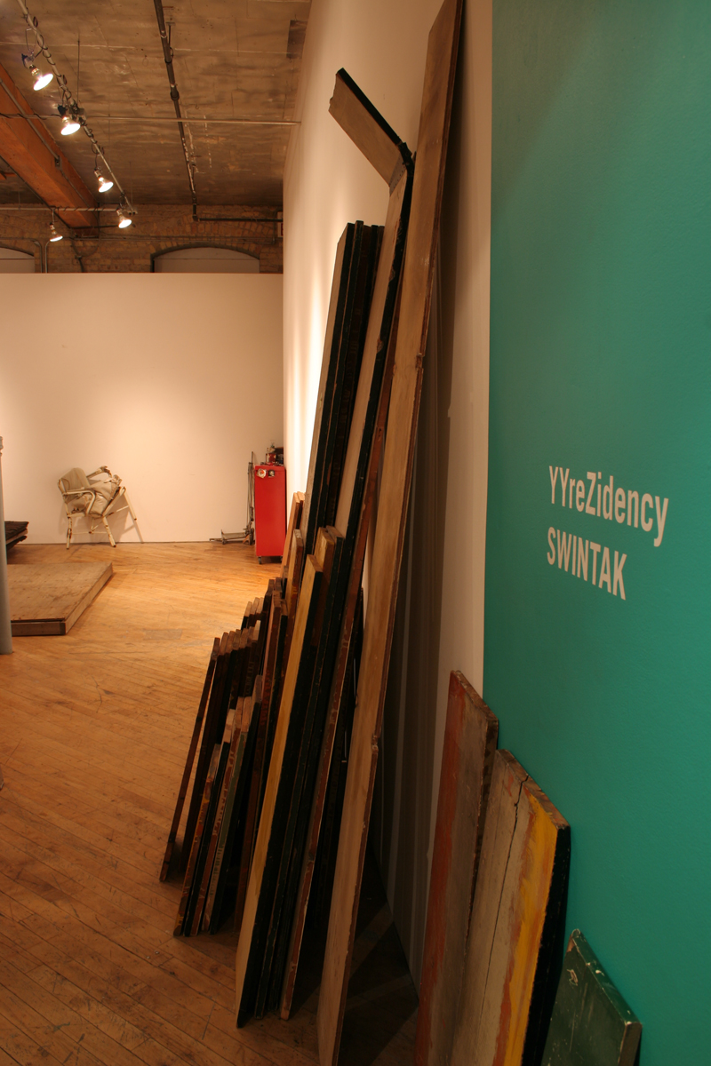 Swintak: Residency, images of wooden planks, laid out.