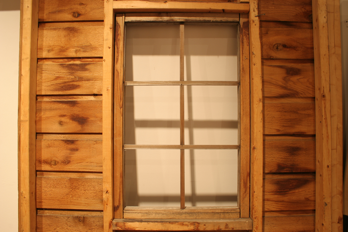 Swintak: Residency, image of wooden window frame..