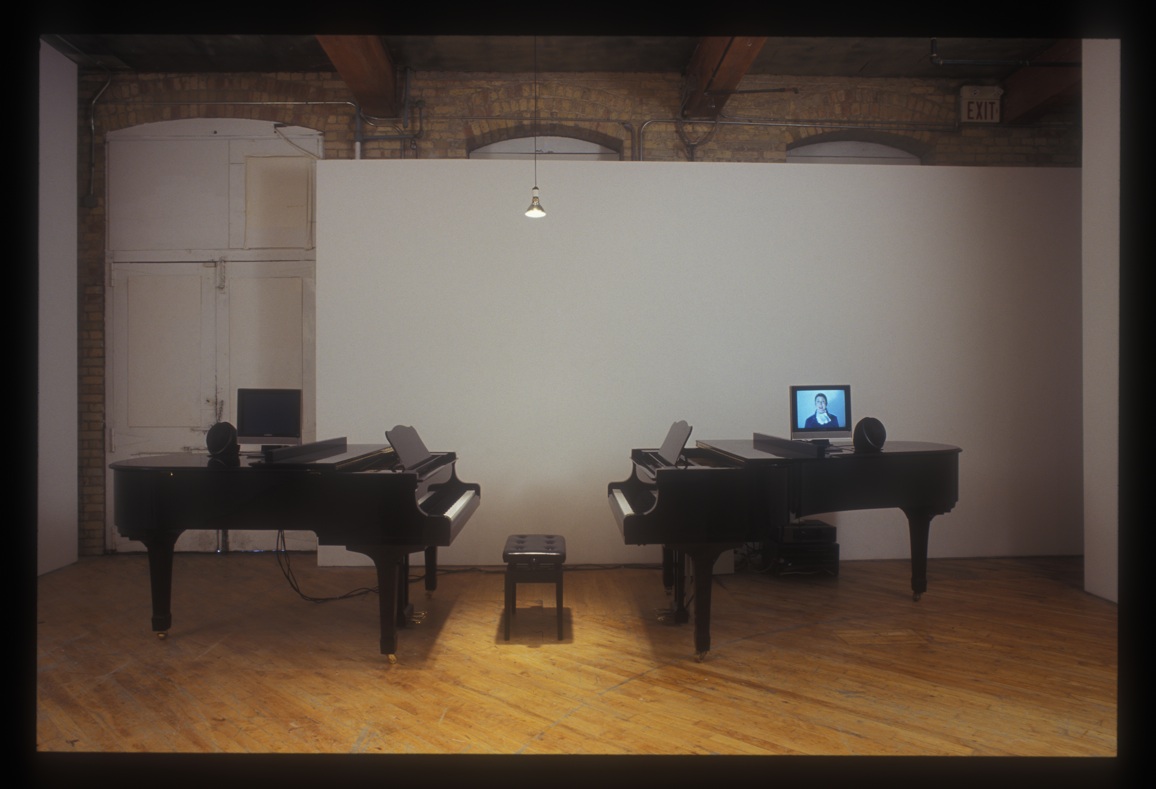 Kenneth Doren: Installation view of two pianos.