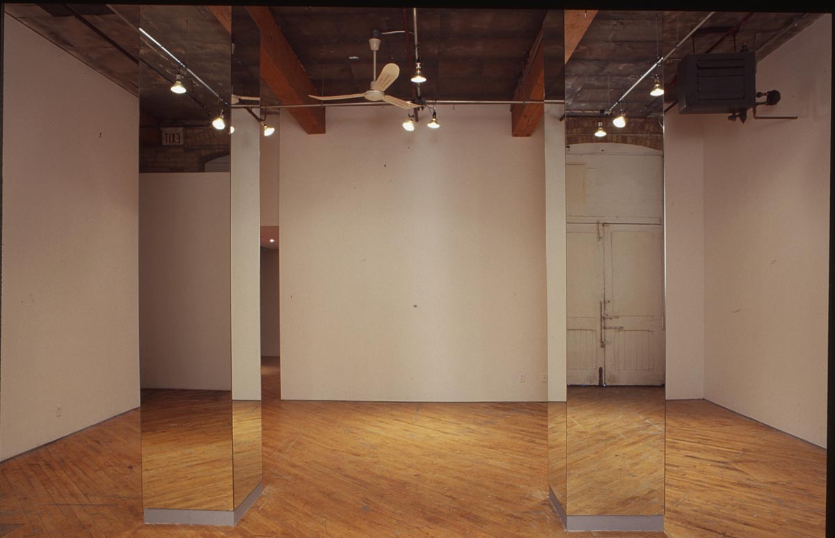 Gordon Lebredt: Installation view, two mirrored pillars.