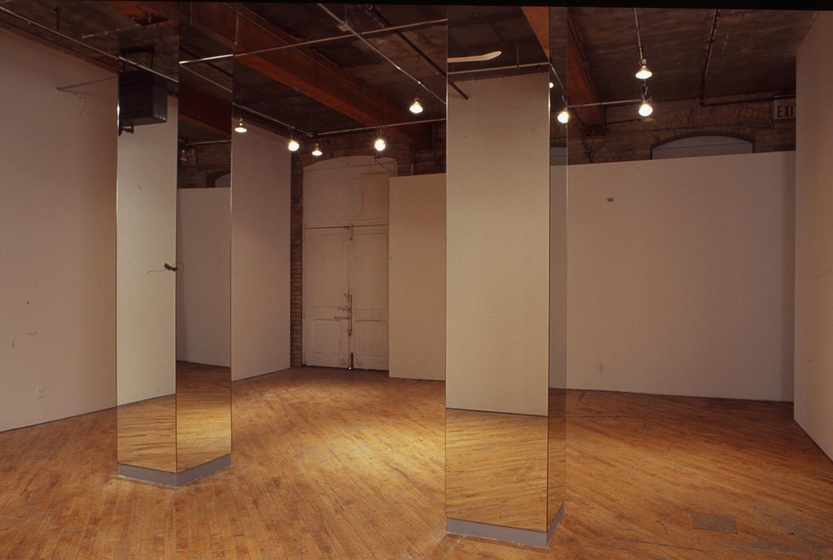 Gordon Lebredt: Installation view, two mirrored pillars.