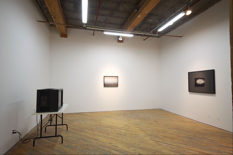 Lorna Bauer, installation view, images of broken glass, and multiple exposure photographs.