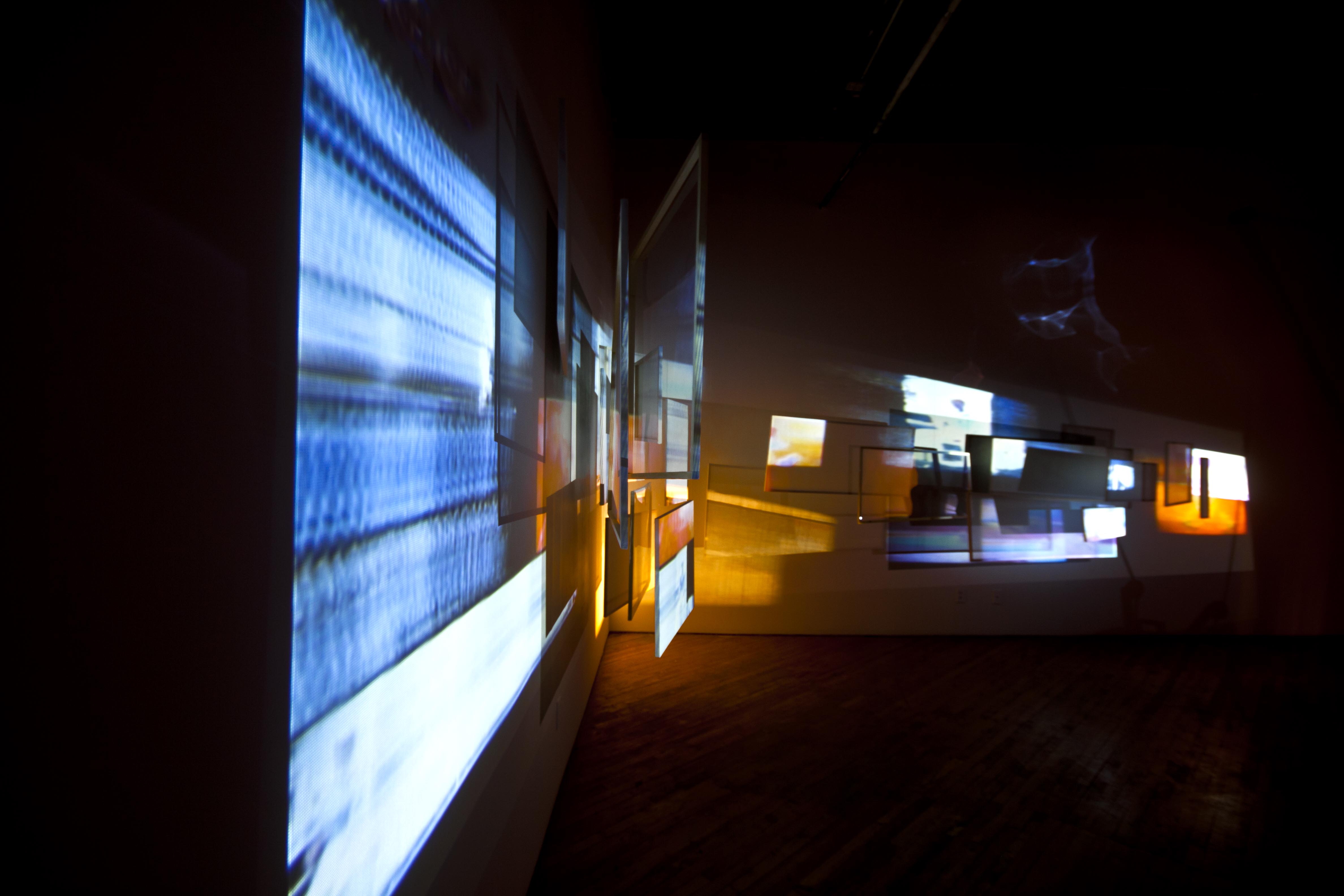 Malena Szlam, installation view, layered video projections.