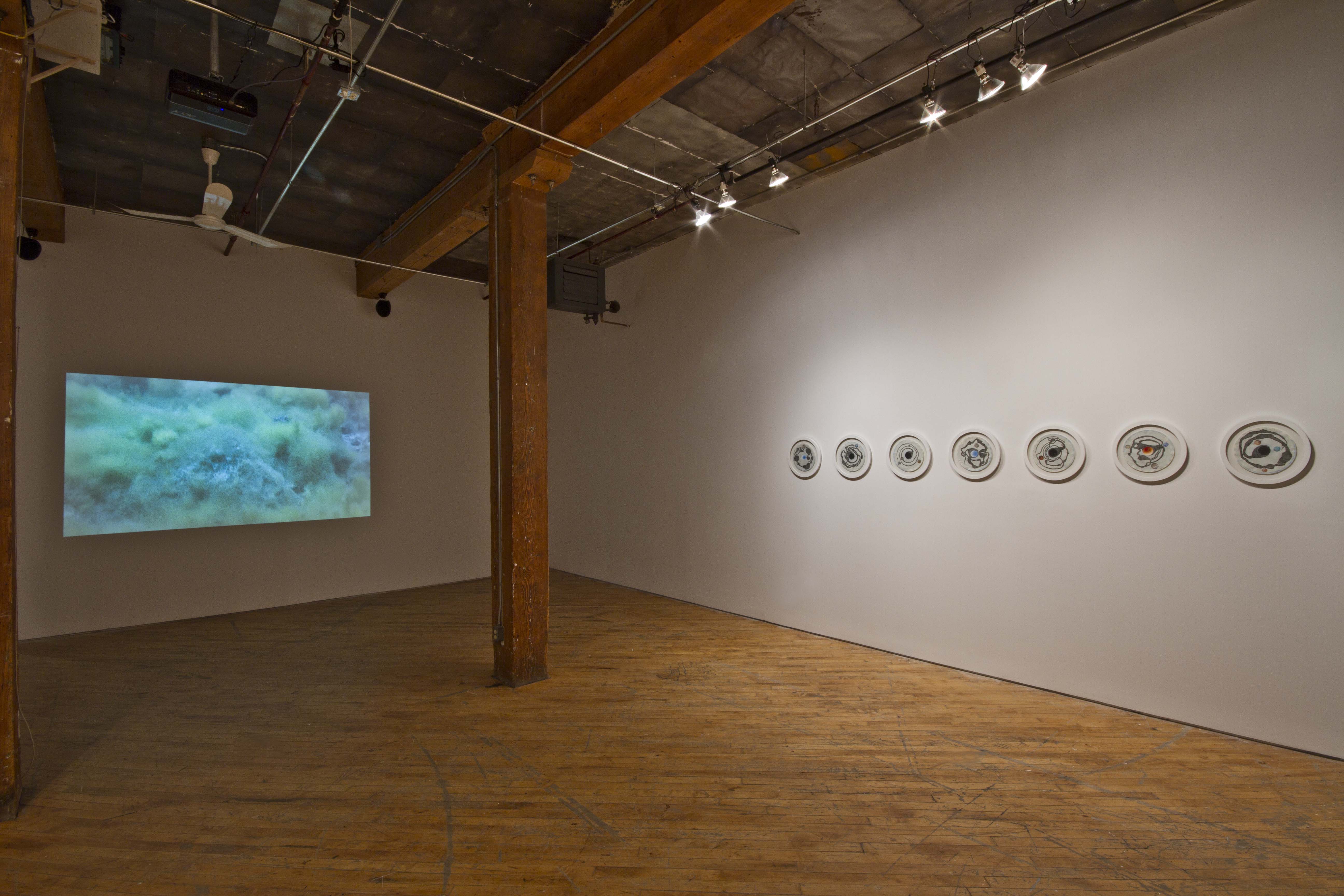 Keith Langergraber: You Can't Go Home Again, installation view video projection and drawings.