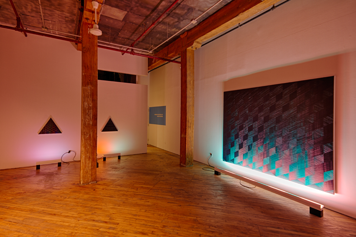 DANIEL HUTCHINSON, installation view, site-sensitive paintings with coloured fluorescent light components under the title Paintings for Electric Light.
