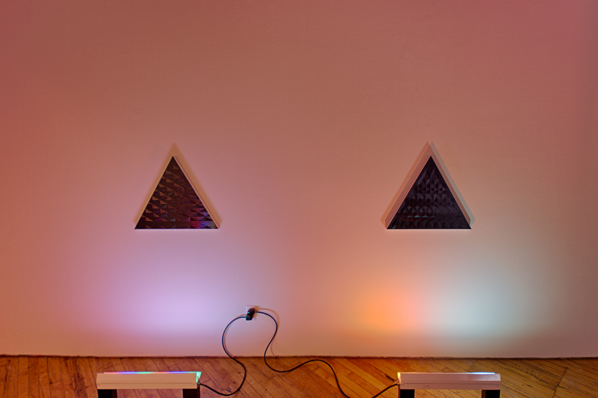 DANIEL HUTCHINSON, installation view, site-sensitive paintings with coloured fluorescent light components under the title Paintings for Electric Light.