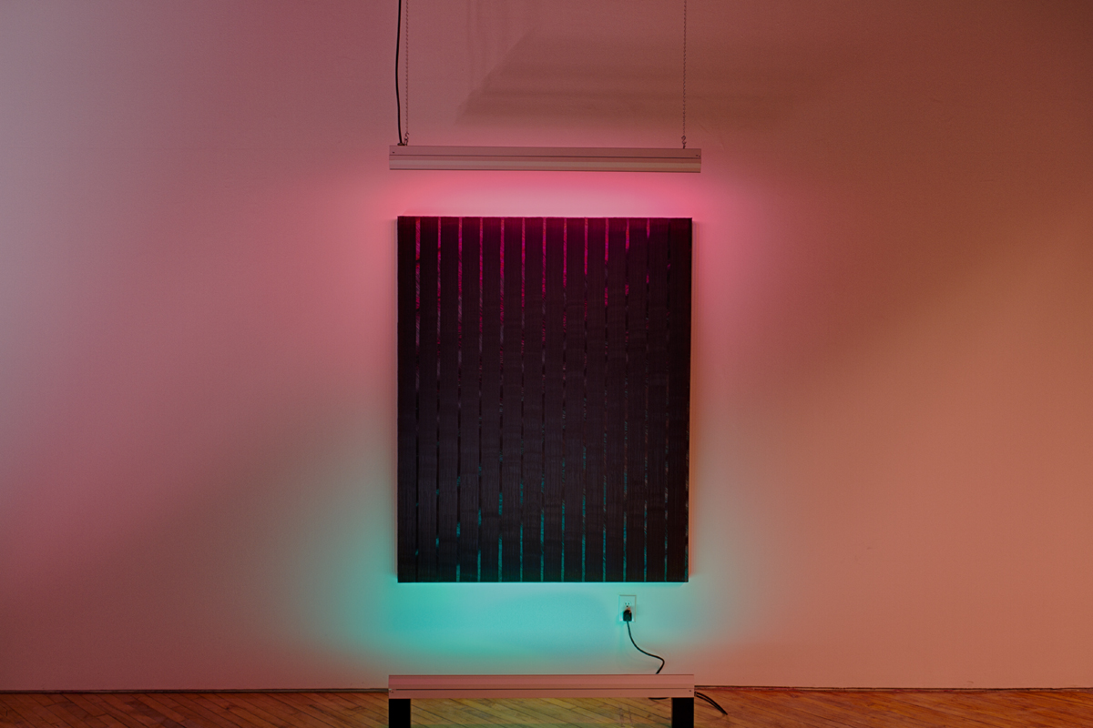 DANIEL HUTCHINSON, installation view, site-sensitive paintings with coloured fluorescent light components under the title Paintings for Electric Light.
