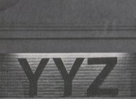 YYZ Black & White image, depicting YYZ signage.