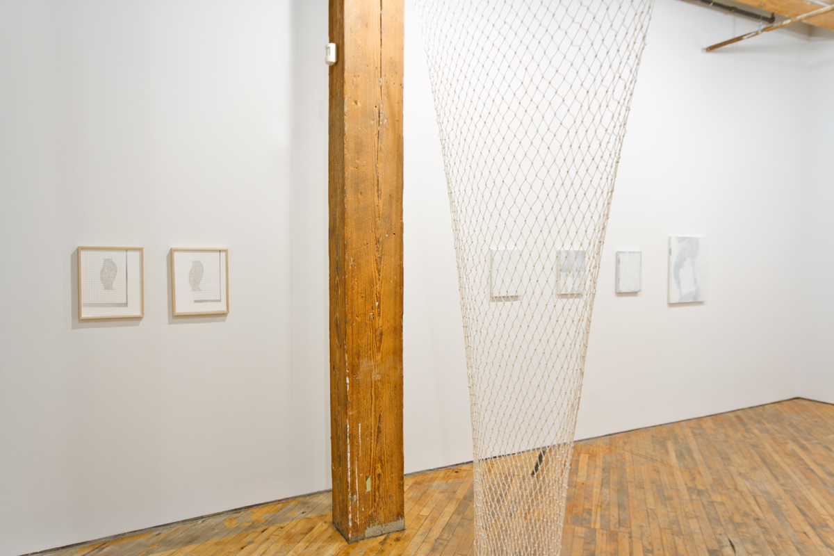 Hanna Hur, An Armchair at a Dimming Window, installation view. multiple images hung on wall.