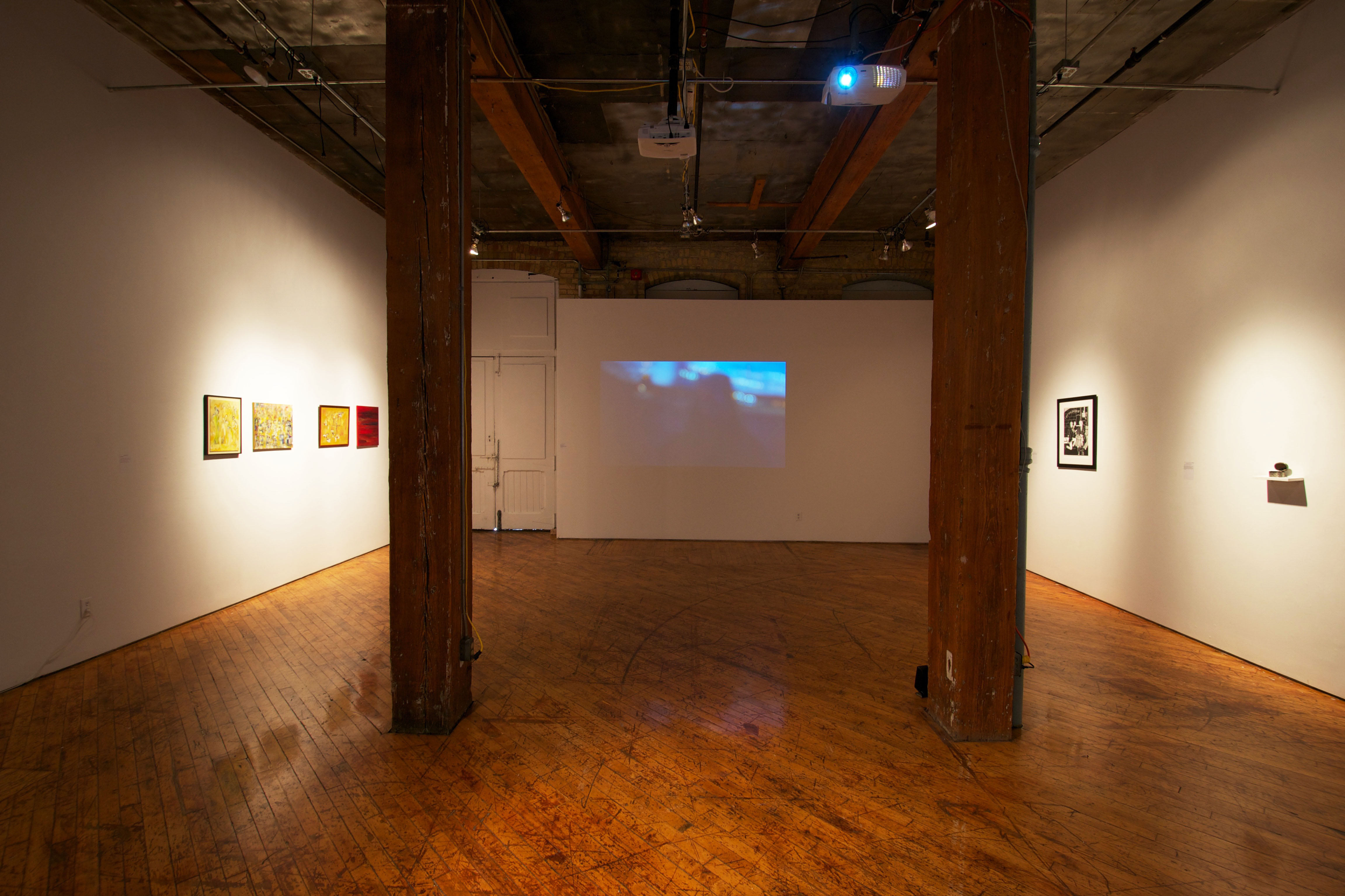 YYZ Lab Installation view, monitors and images populate the gallery.