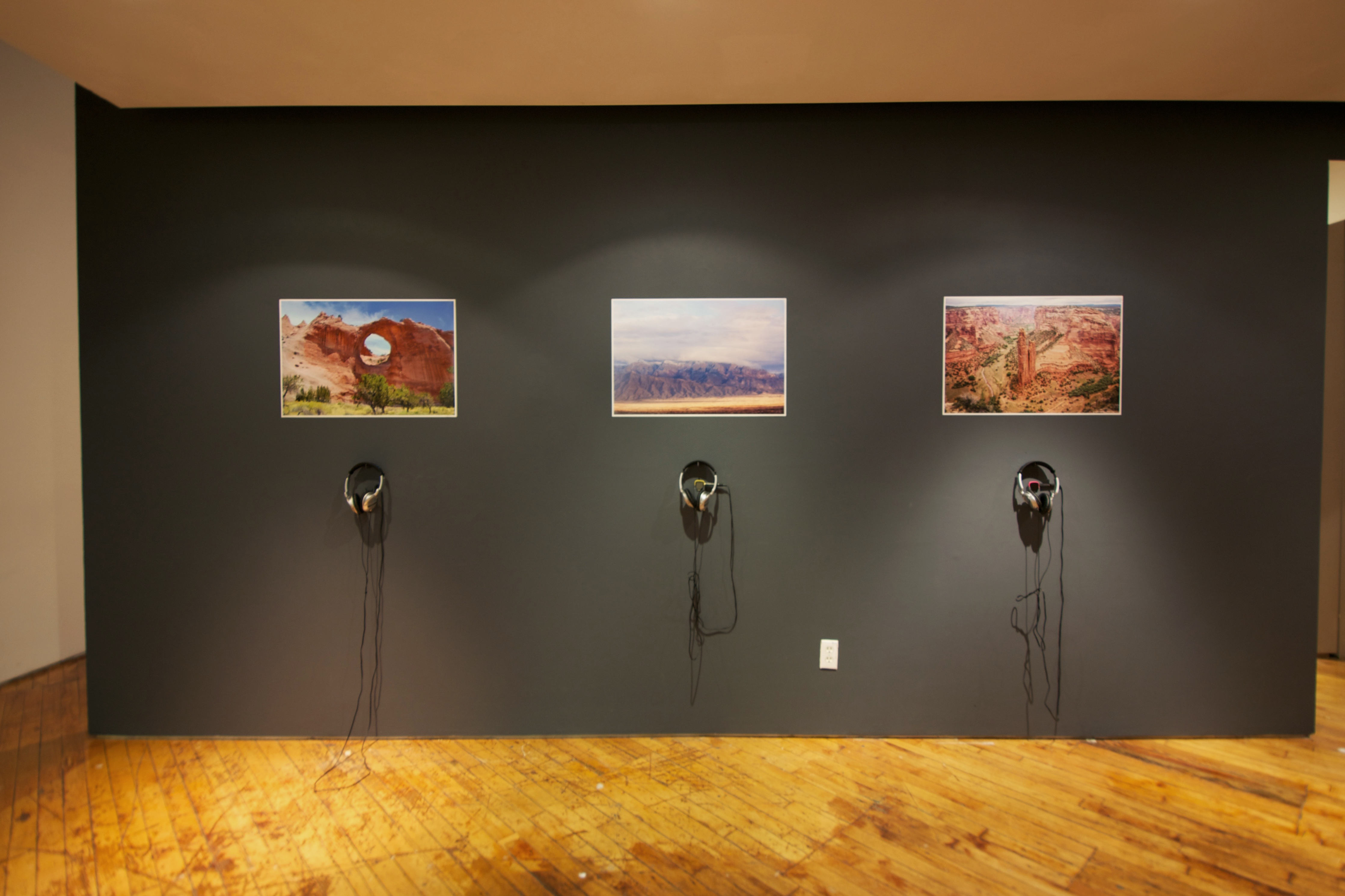 Raven Chacon, installation view, Prints with headphones below.