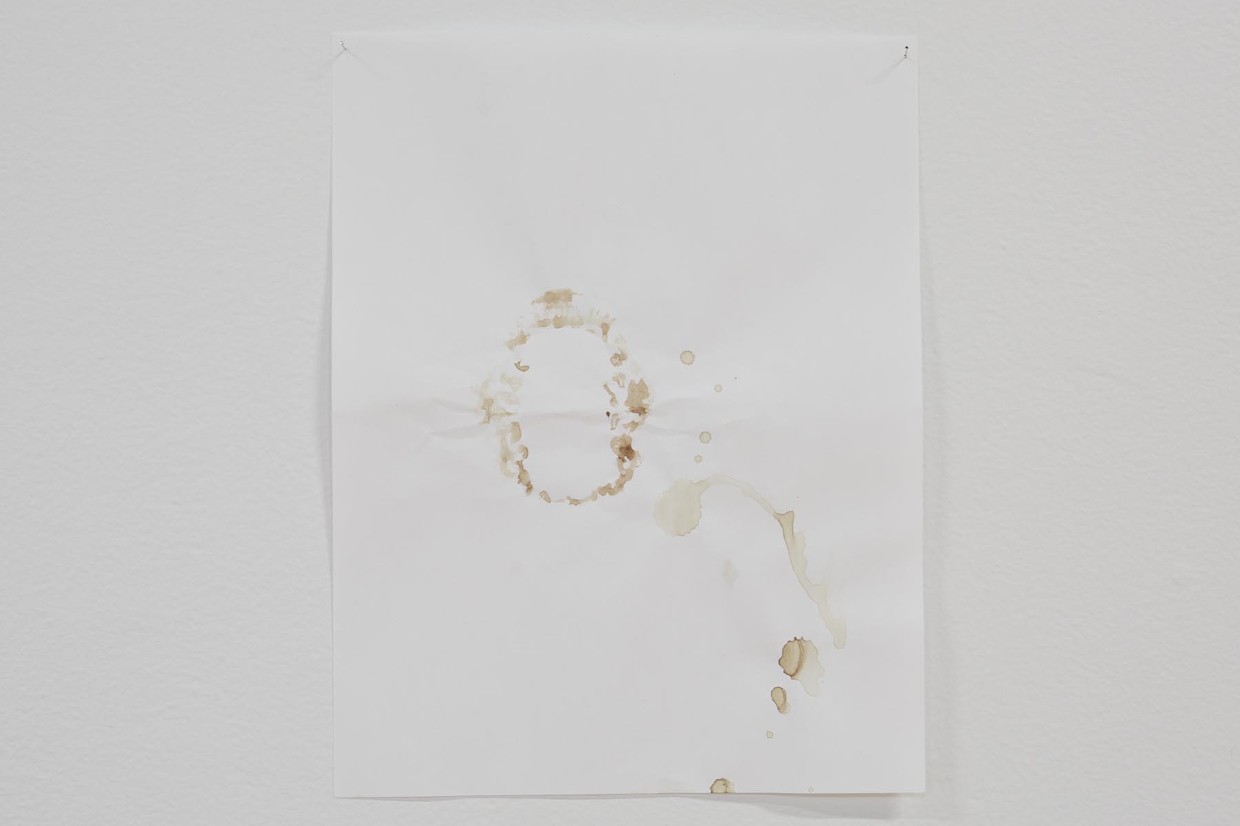 Gustavo Artigas, a series of abstract drawings made on simple Letter white bond sheets, hanging from the walls, delicately sustained by pins