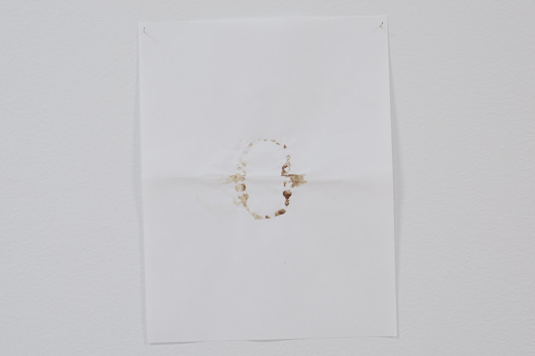 Gustavo Artigas, a series of abstract drawings made on simple Letter white bond sheets, hanging from the walls, delicately sustained by pins