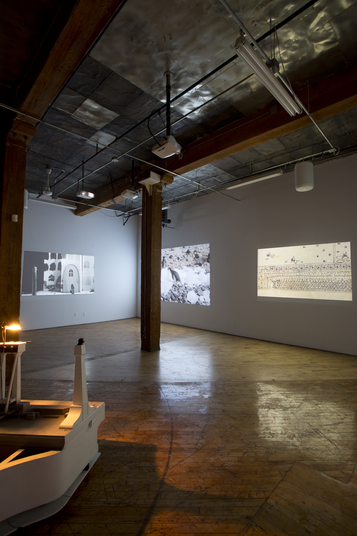 Installation View: The South Gallery, Arrivals, A baby grand piano has been subjected to Nicol’s sculptural gesture of being turned upside down.