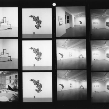 Contact sheet of black and white photos of art in gallery