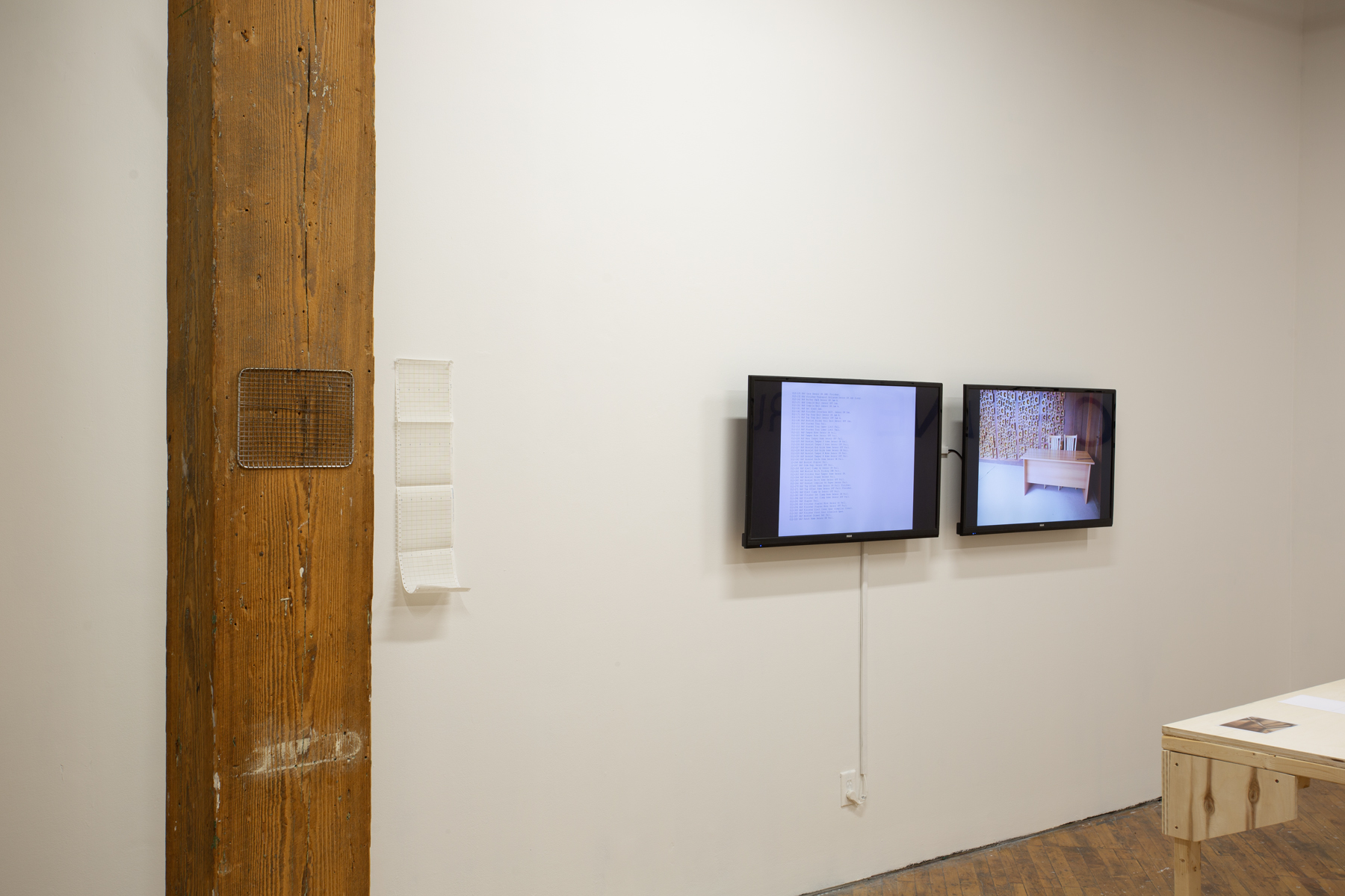 Yusuf Hassan, installation view, two monitors