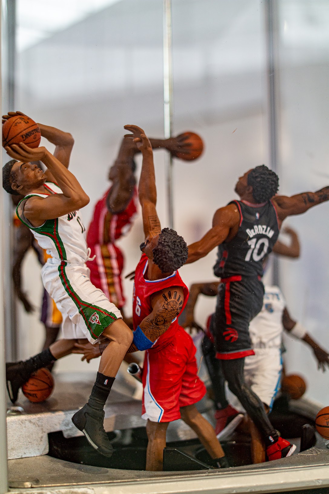 Figurines of men basketball players